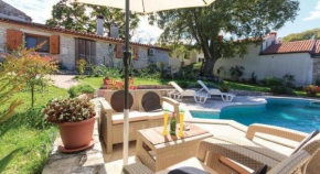 Ferienhaus mit Terrasse, Garten und Gemeinschaftspool sowie herrlicher Aussicht